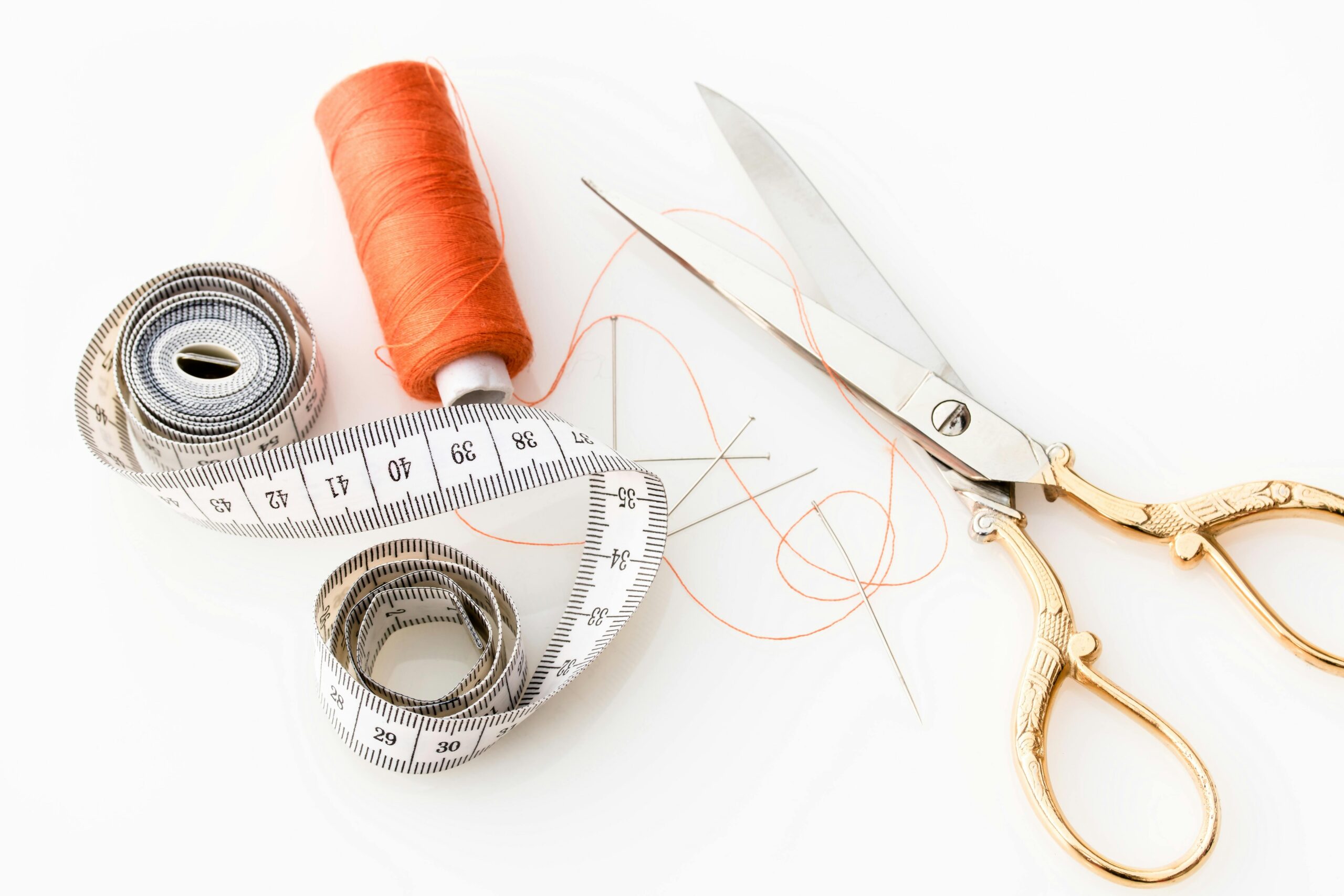 A stock image showing various sewing tools.