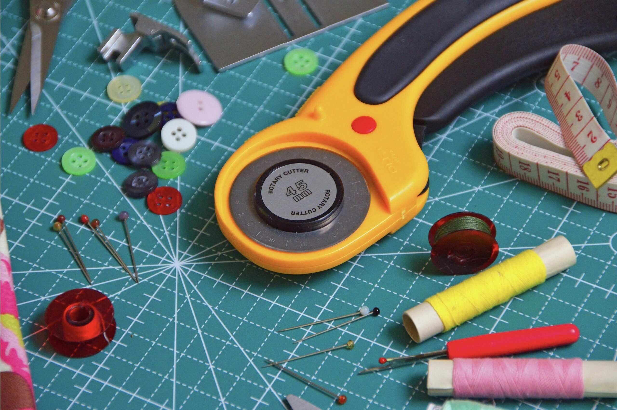 A stock image of a variety of colorful sewing tools.